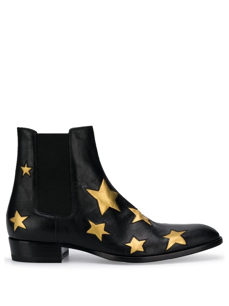 Saint Laurent Wyatt 30 star motif boots - Black