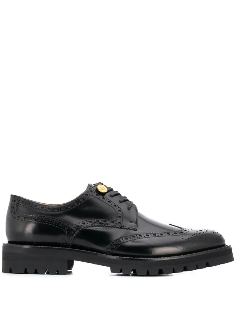Medusa embossed button brogues