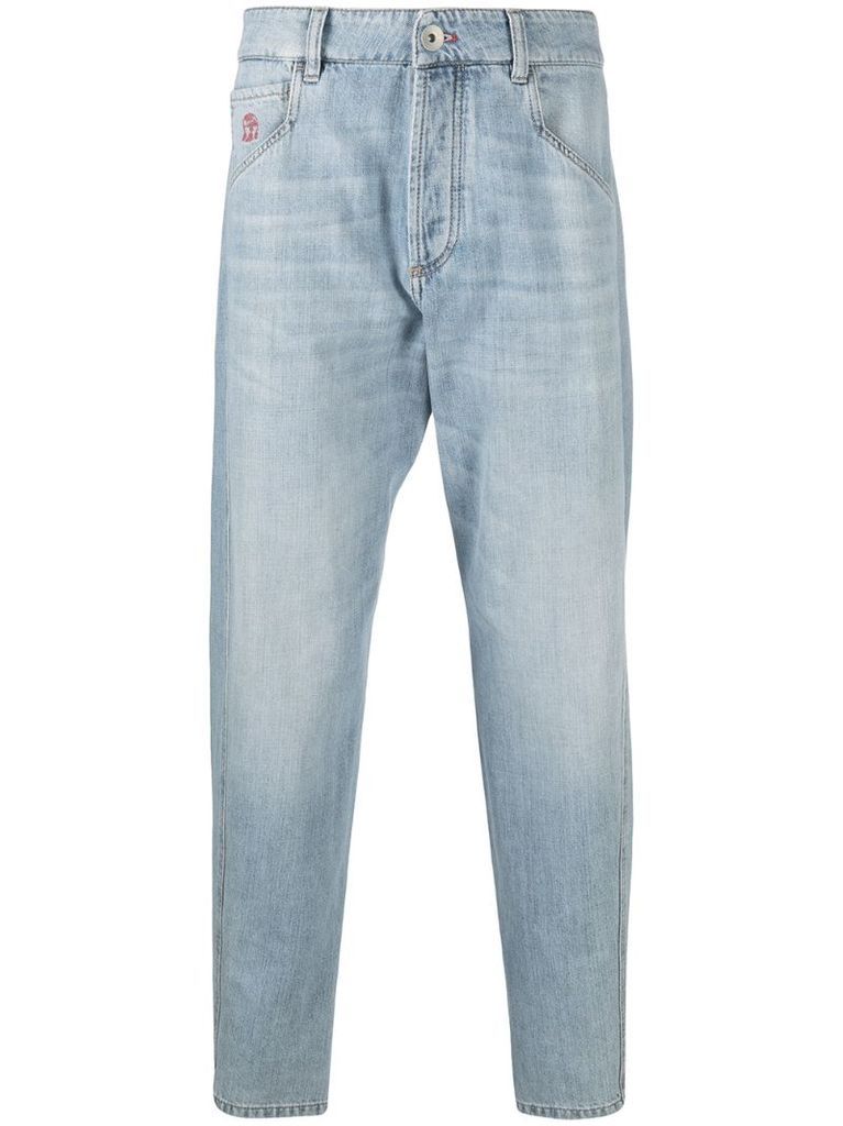 light-wash tapered jeans