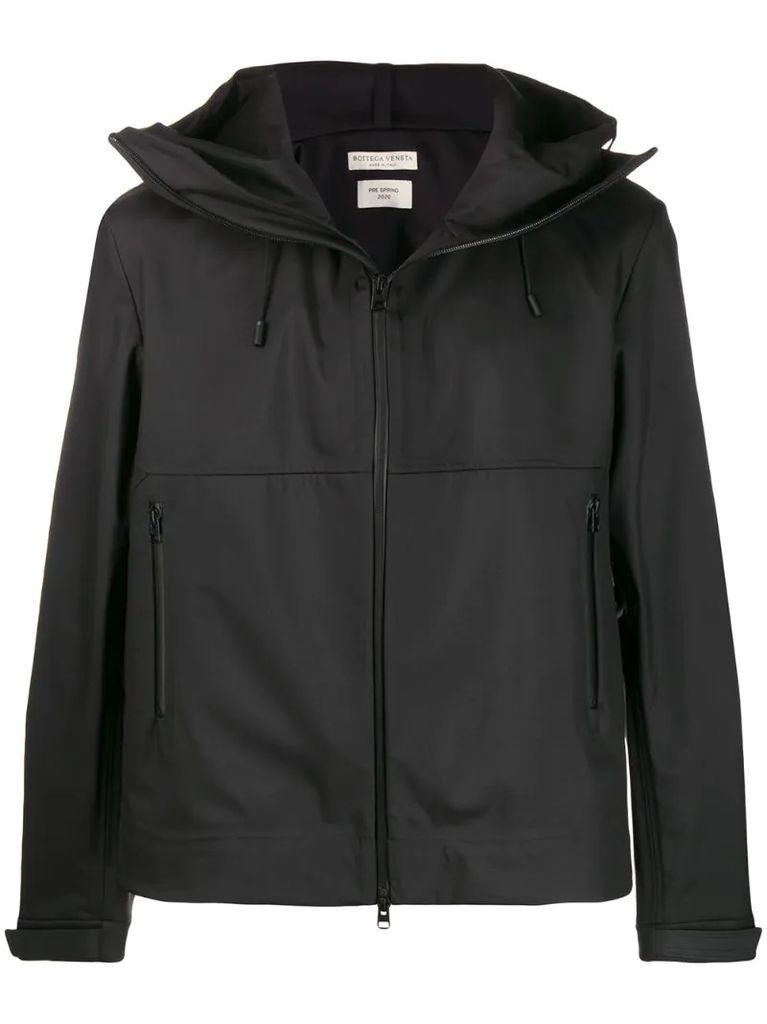 zipped up hooded jacket