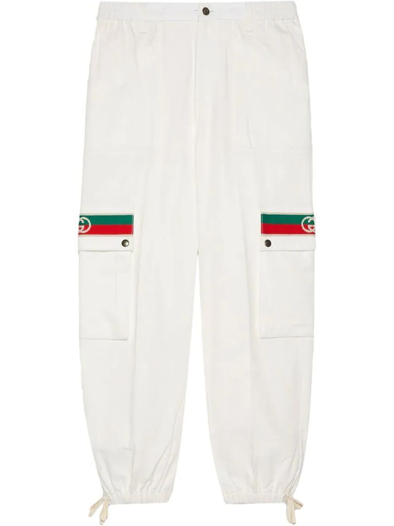 Web detailing tapered-fit trousers