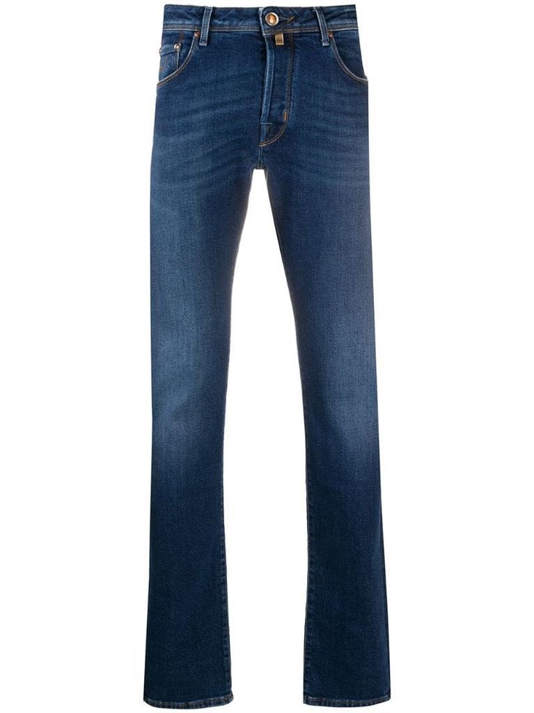 whiskered slim-fit jeans