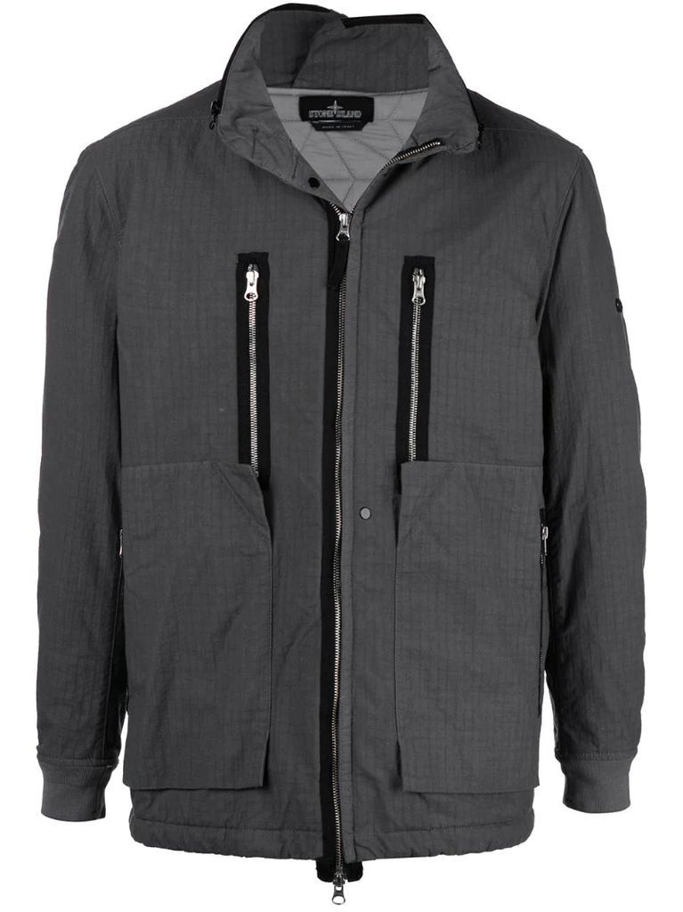 zipped-up jacket