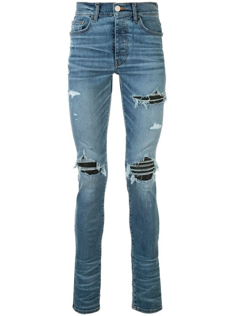 MX1 distressed skinny jeans