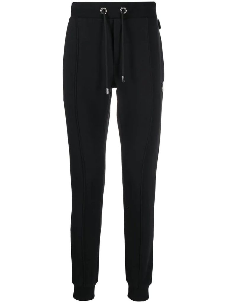 skinny-fit track pants with logo patch