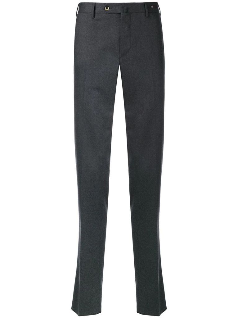 creased slim-fit trousers