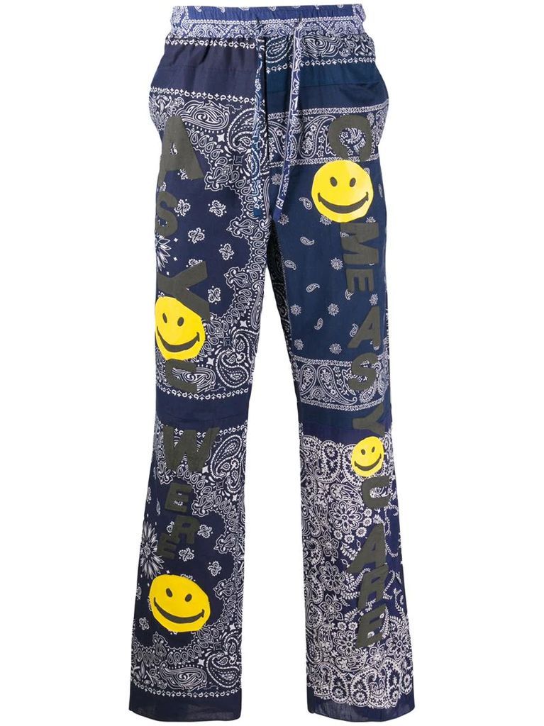 paisley-print smiley face trousers