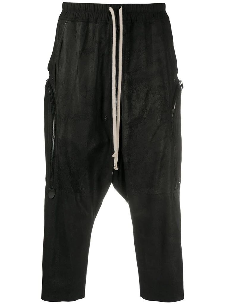 drop crotch cropped leather trousers