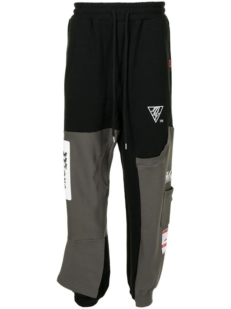 layered two-tone track pants