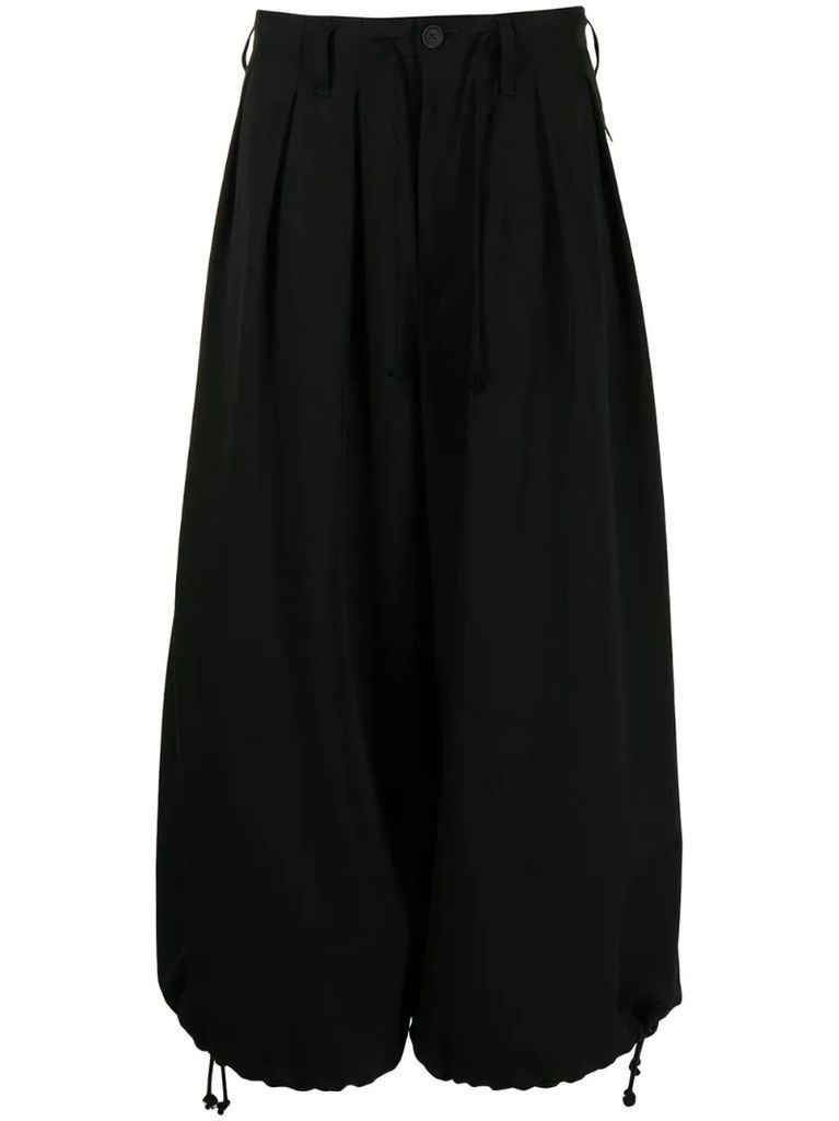 pleated drop-crotch wool trousers