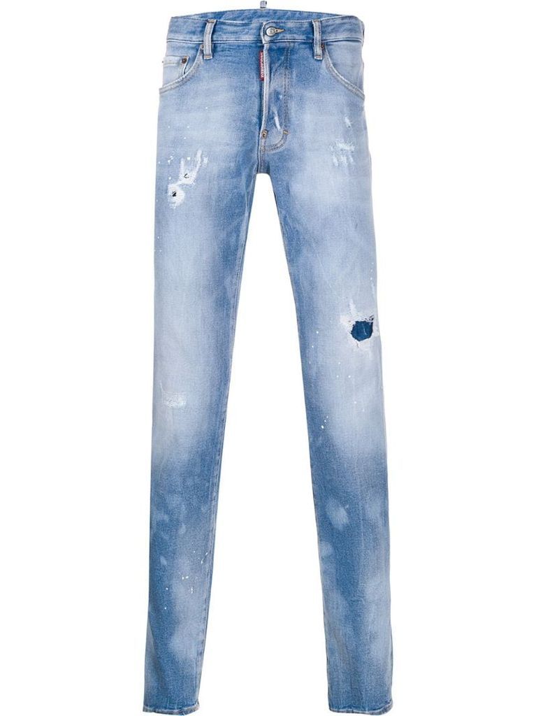 distressed effect logo patch jeans