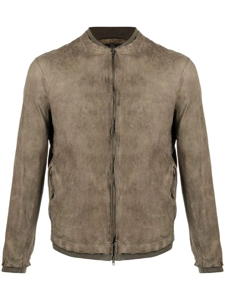 zipped-up leather jacket