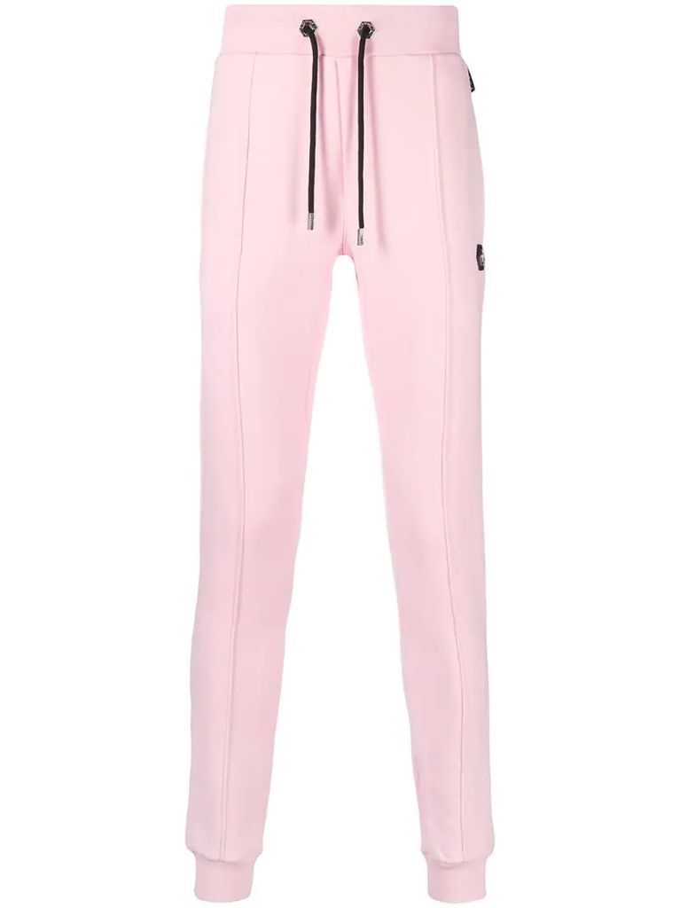 skinny-fit track pants with logo patch