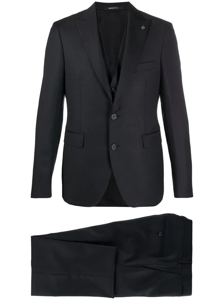 peaked-lapel three-piece piqué suit