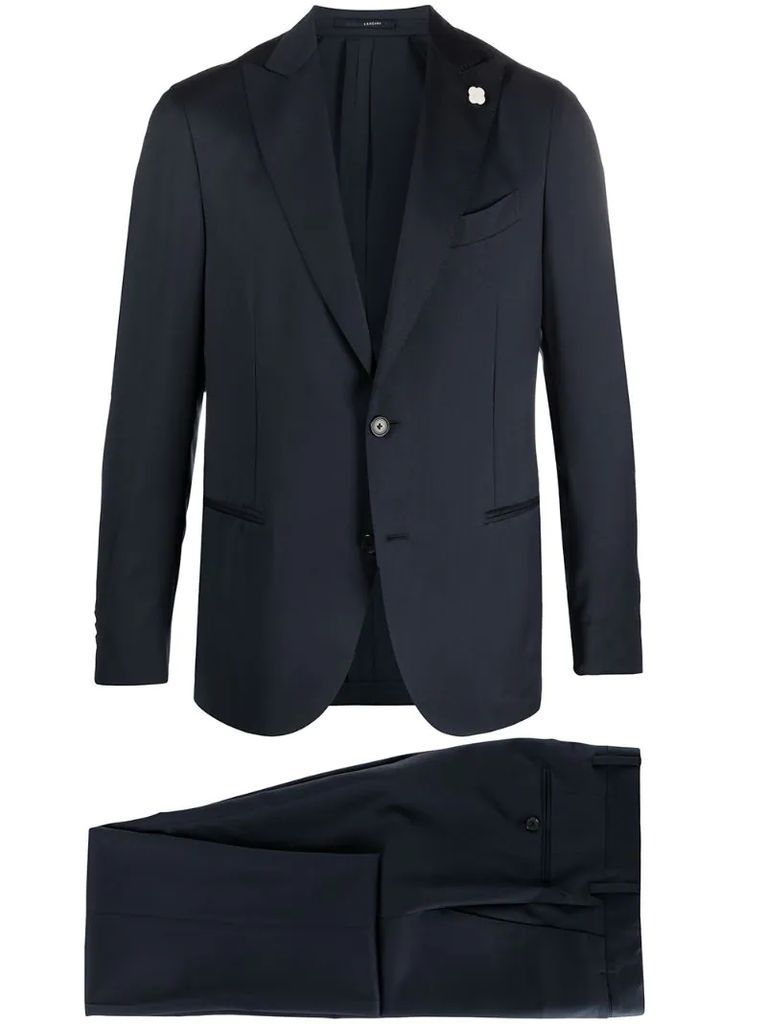 brooch-embellished tailored suit