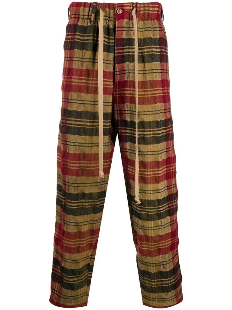 treated plaid check trousers