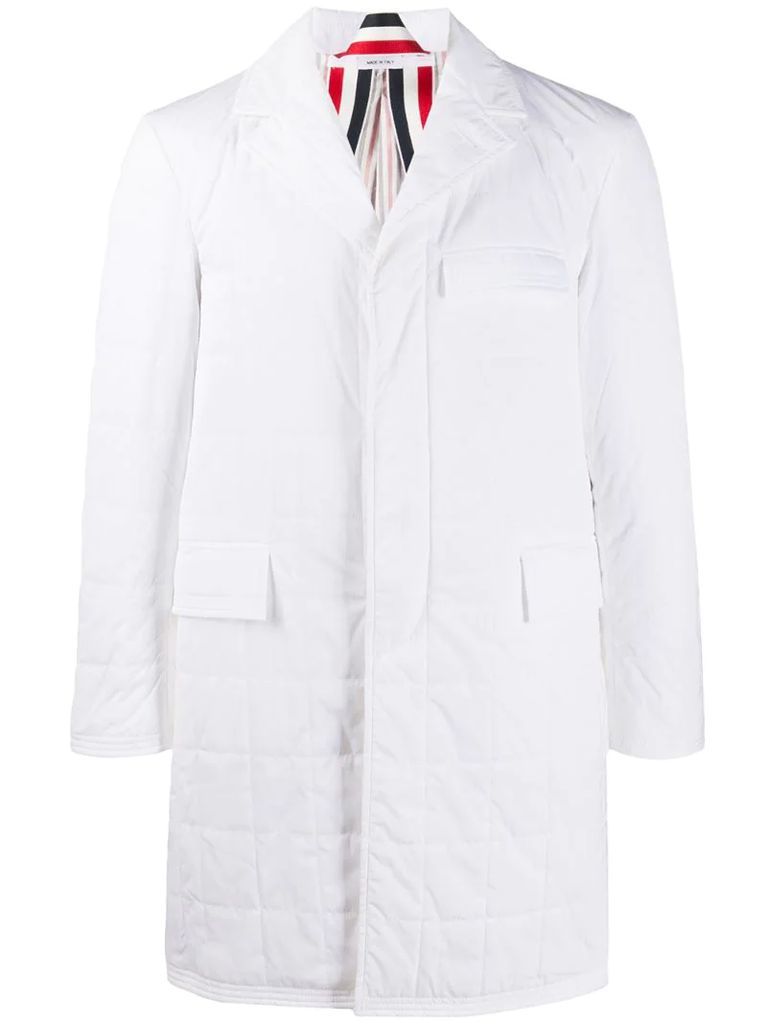 white quilted jacket with tri-stripe detail at back