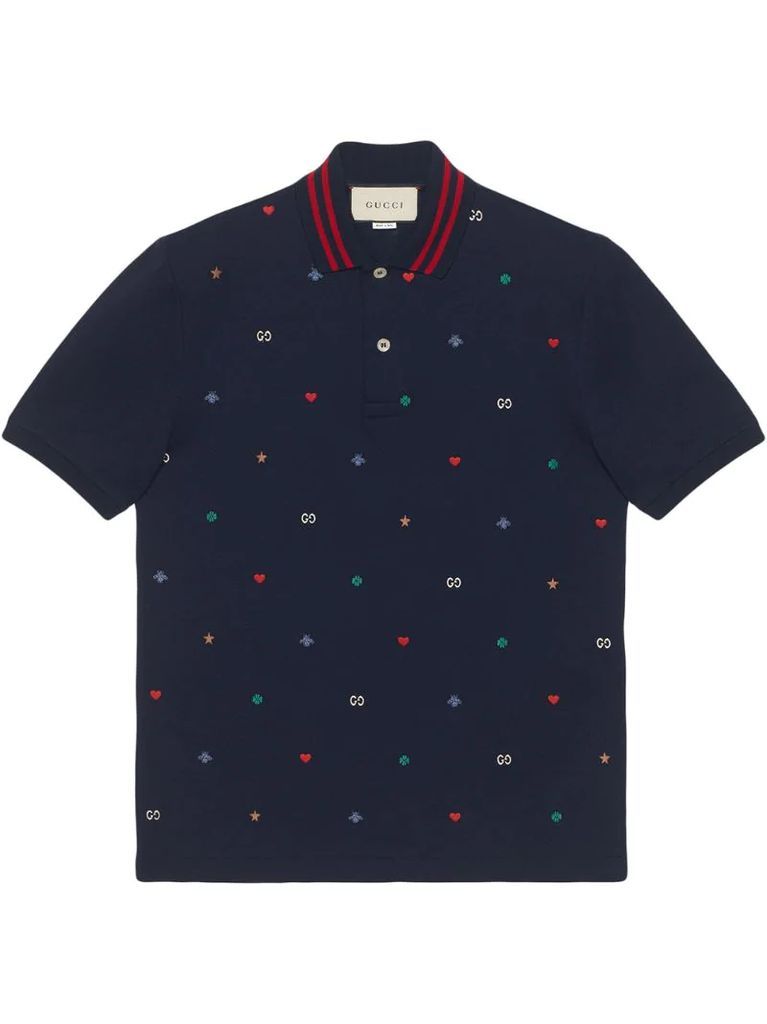 Polo with symbols embroidery