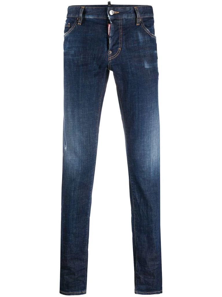 distressed low-rise slim-fit jeans