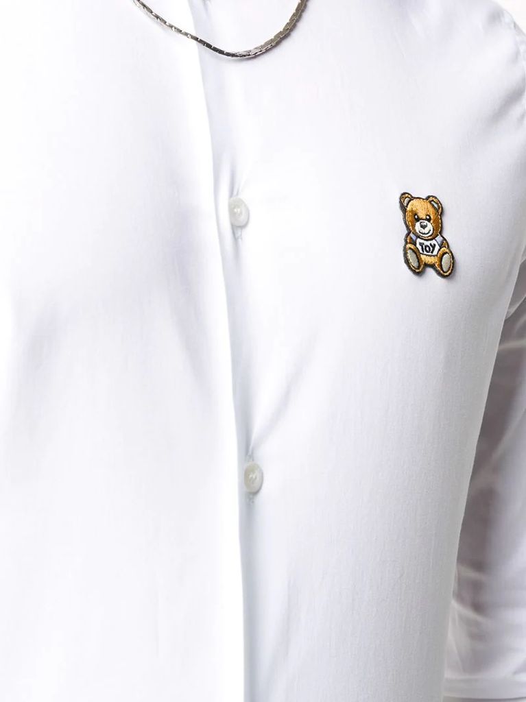 teddy bear-patch shirt