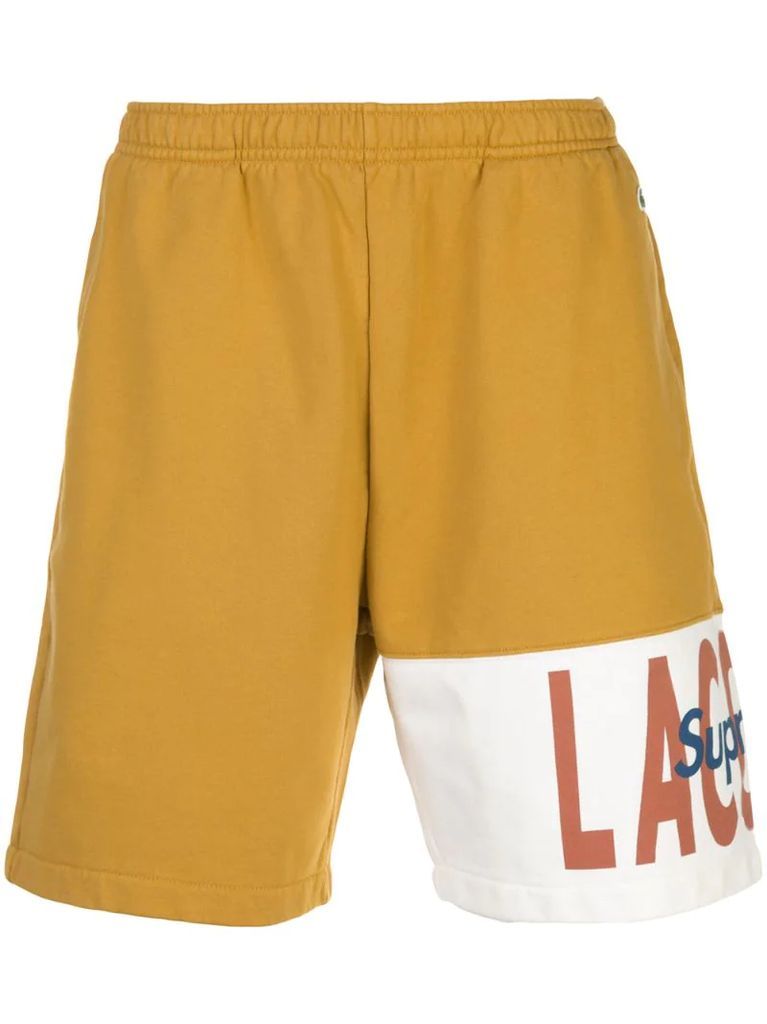 Lacoste logo panel track shorts
