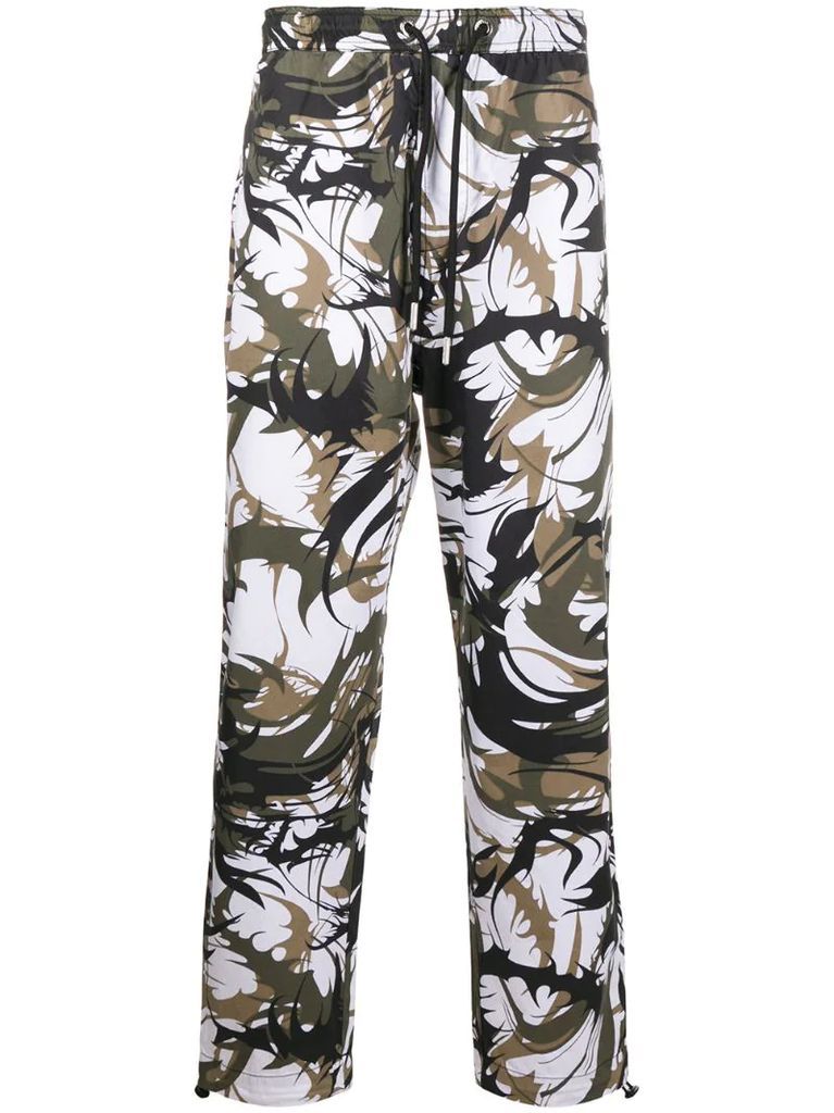 abstract camouflage print trousers