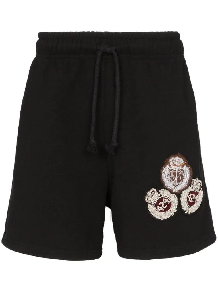 crest embroidered track shorts