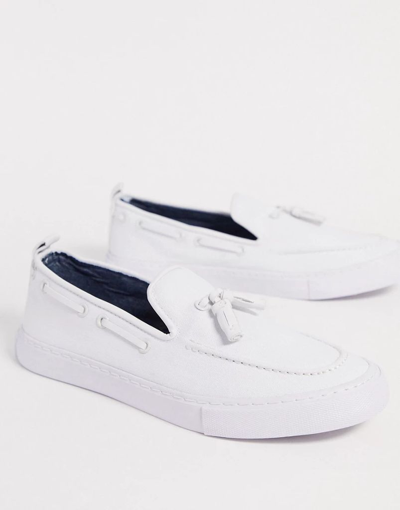 slip on trainers in white with tassel