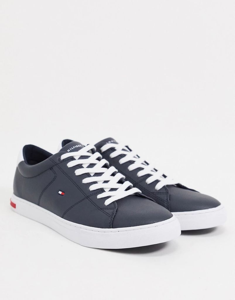 essential leather trainer in navy with small flag logo