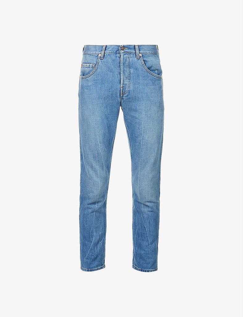 Tapered faded-wash denim jeans