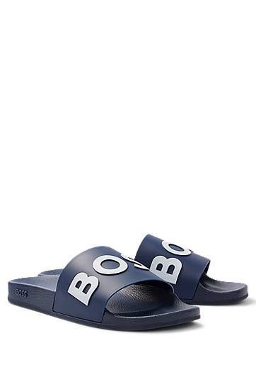 Italian-made slides with contrast-logo strap