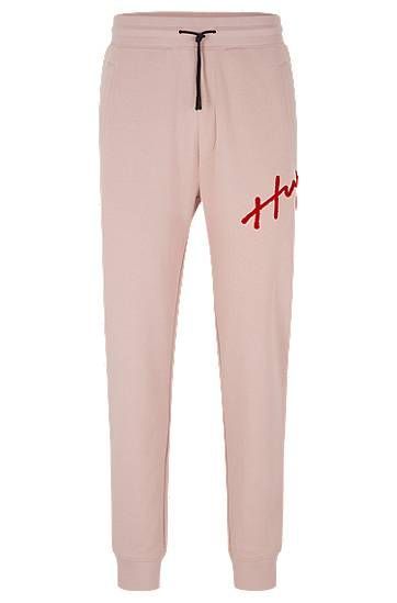 Cotton-terry tracksuit bottoms with handwritten logo embroidery