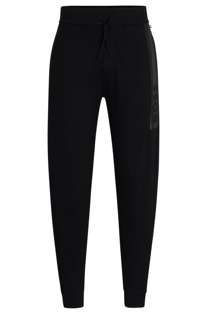 Cuffed tracksuit bottoms in French terry with logo print