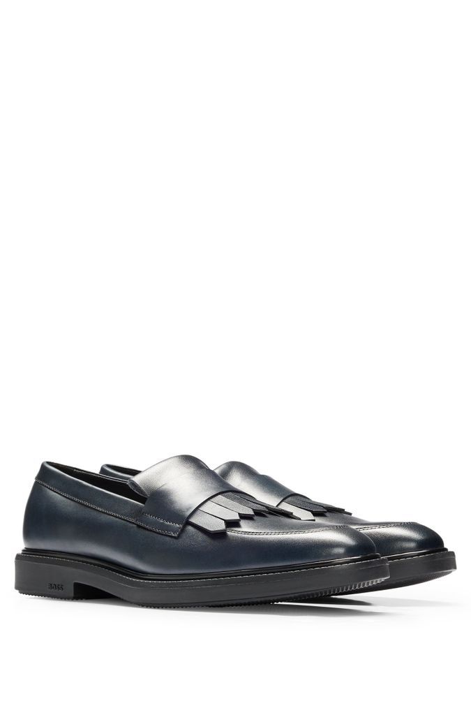 Apron-toe loafers in leather with fringe trim