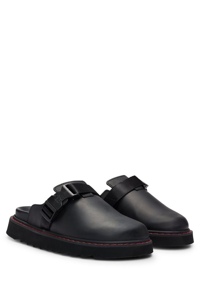 Leather slip-on shoes with branded buckle