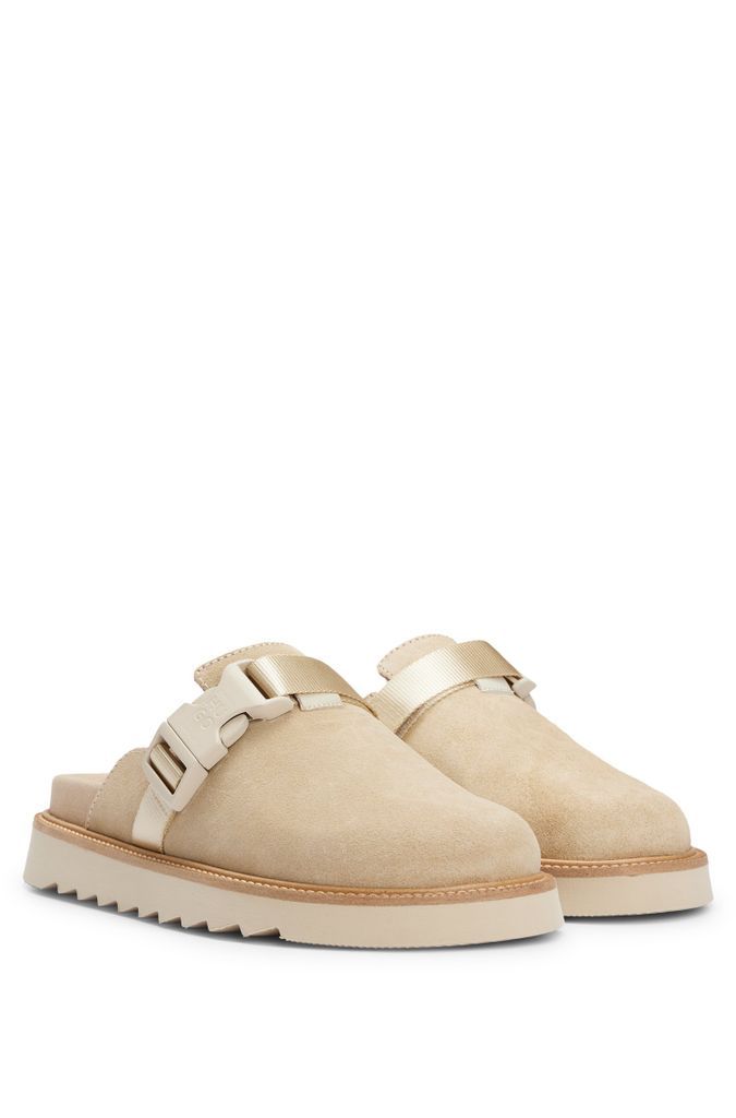 Suede slip-on shoes with buckled strap