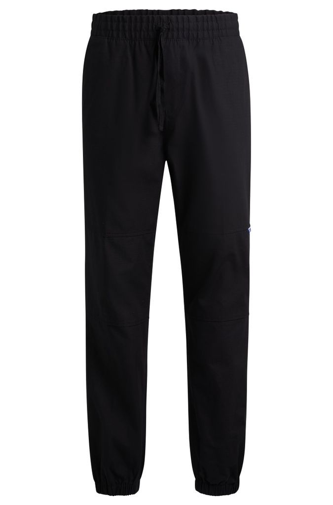 Tapered-fit trousers in structured cotton