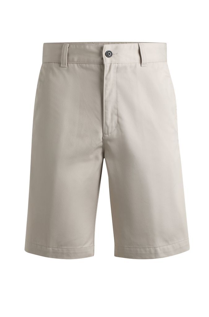 Regular-fit shorts with slim leg and buttoned pockets