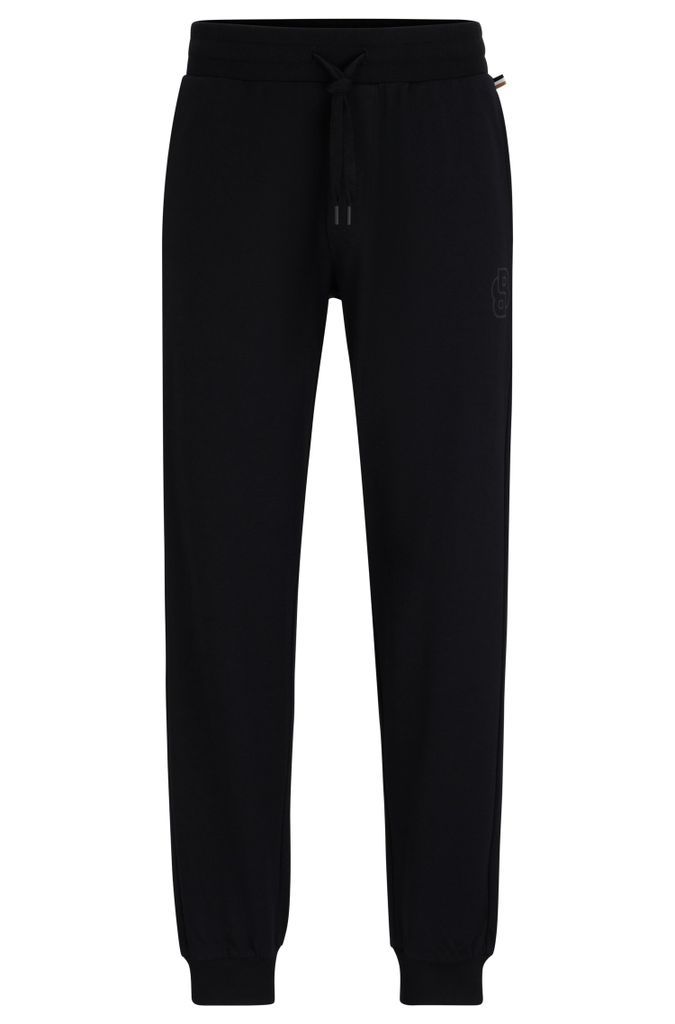 Cuffed tracksuit bottoms in cotton terry with double monogram
